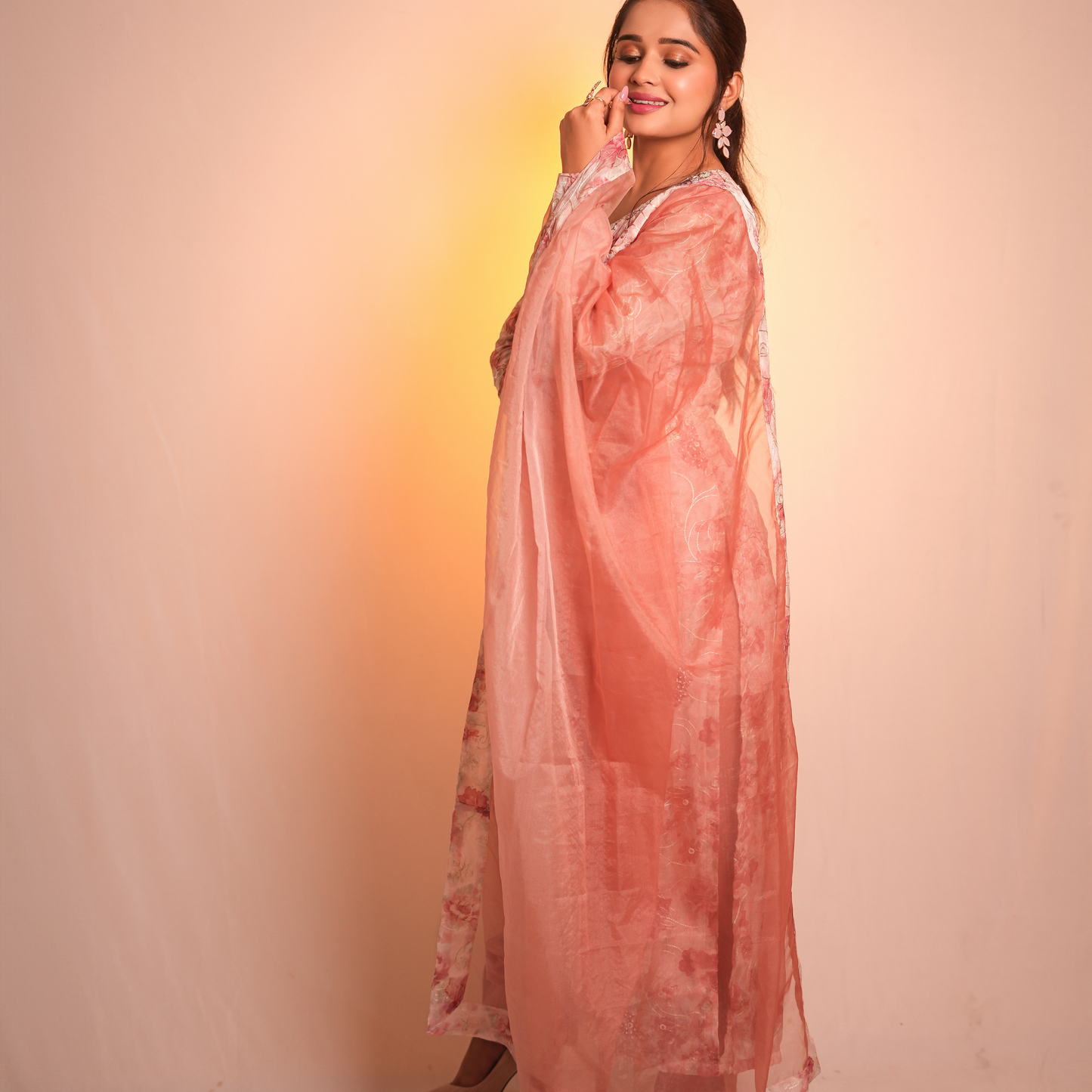 A peach-colored Pakistani suit by SLC in cotton fabric