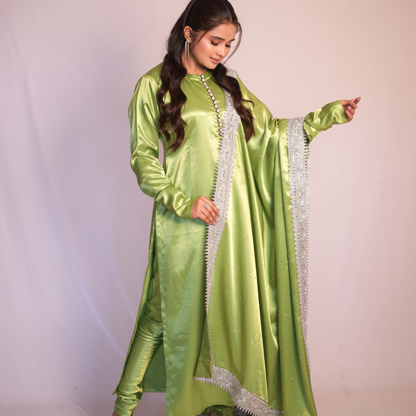 A pista green Pakistani suit by SLC Fabric