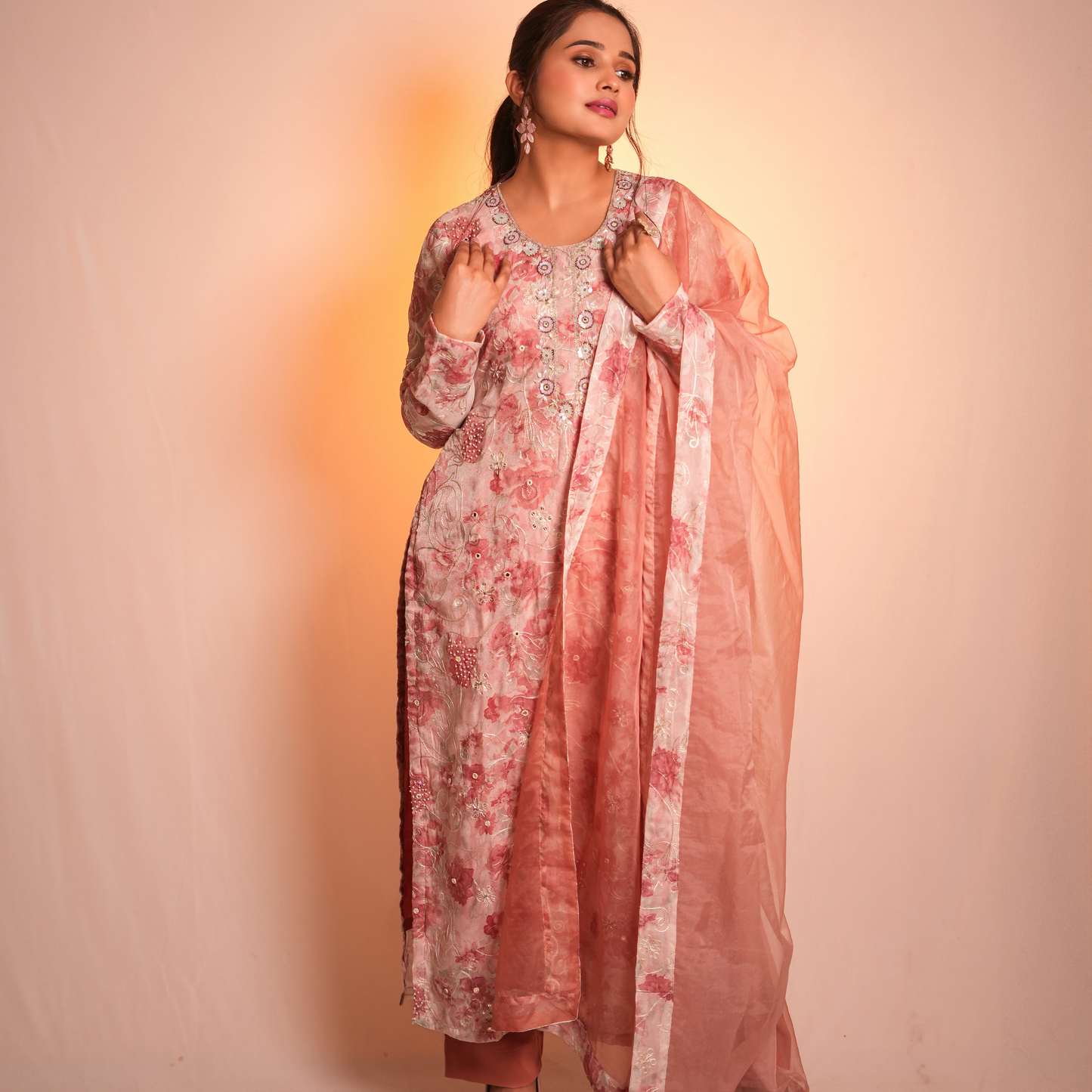 A peach-colored Pakistani suit by SLC in cotton fabric