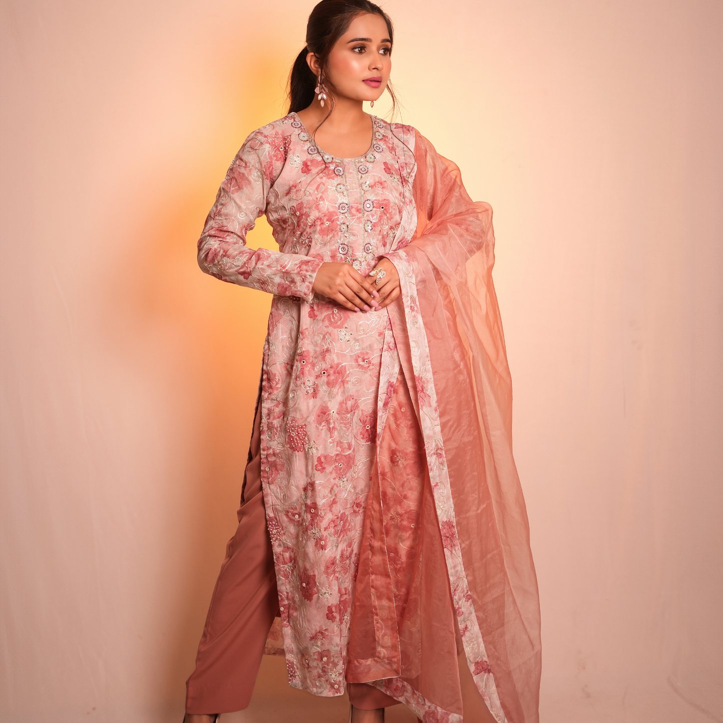 A peach-colored Pakistani suit by SLC in cotton fabric