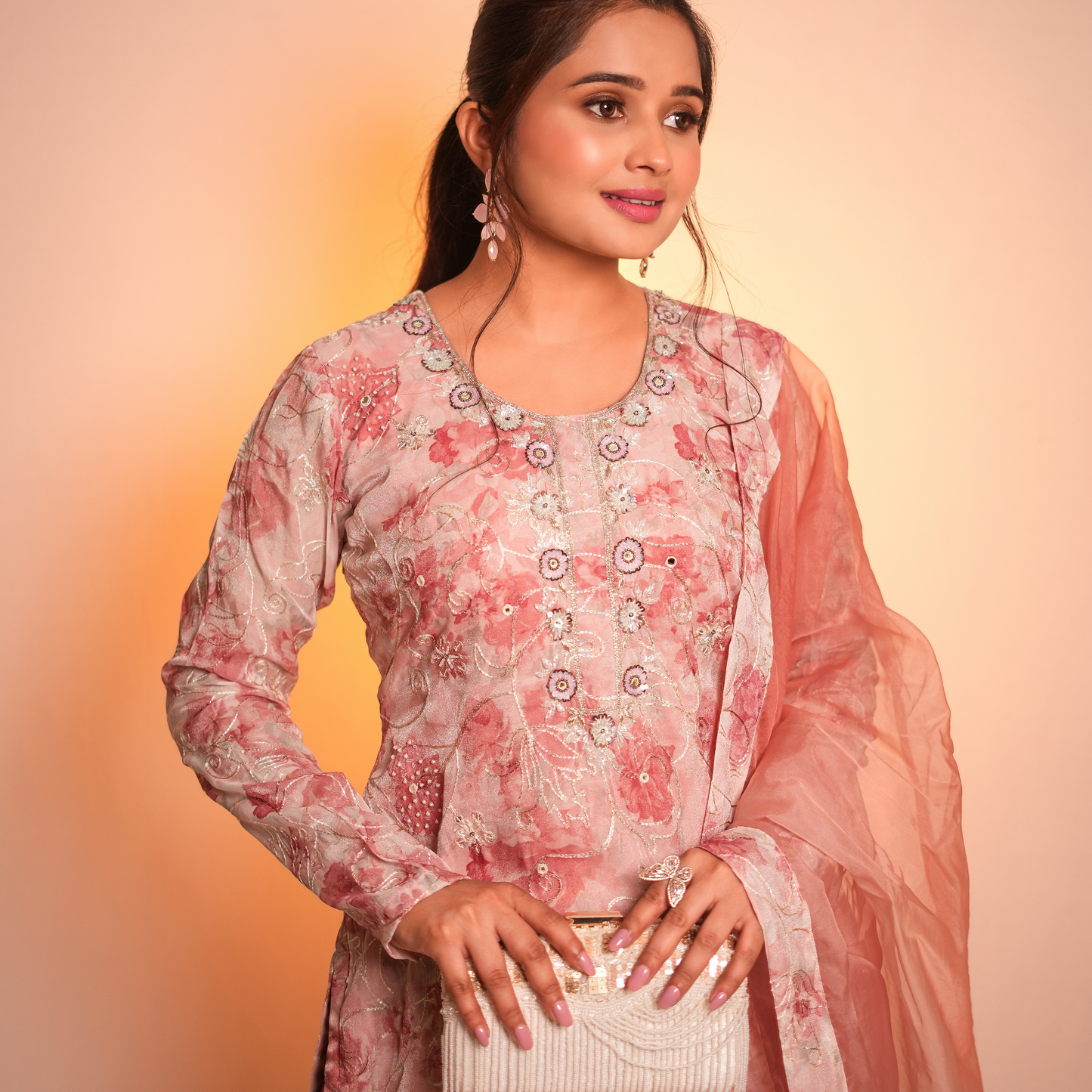 A peach-colored Pakistani suit by SLC in cotton fabric