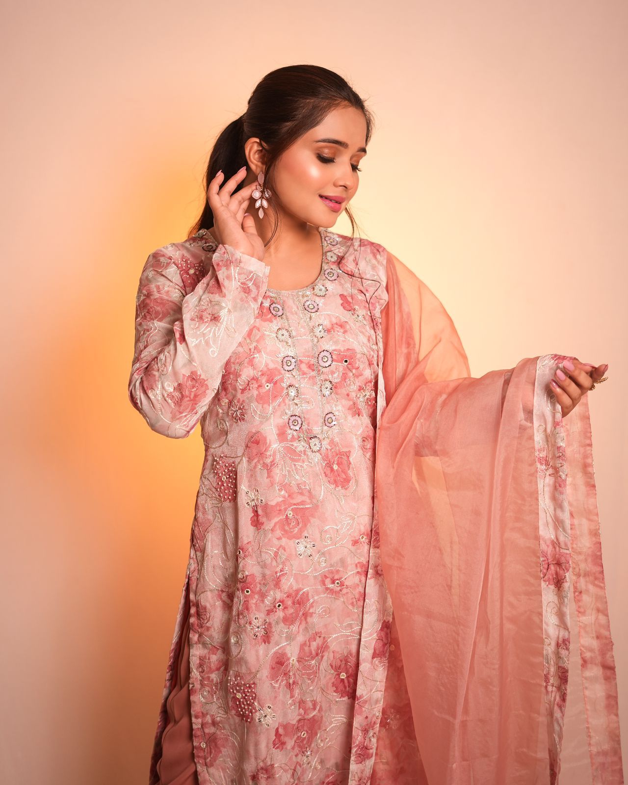 A peach-colored Pakistani suit by SLC in cotton fabric